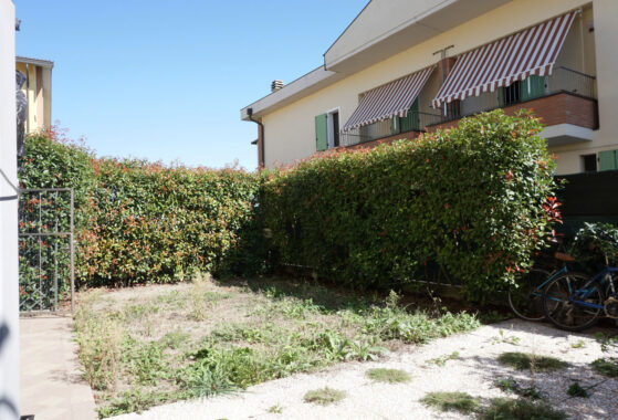 TRILOCALE CON GIARDINO PRIVATO