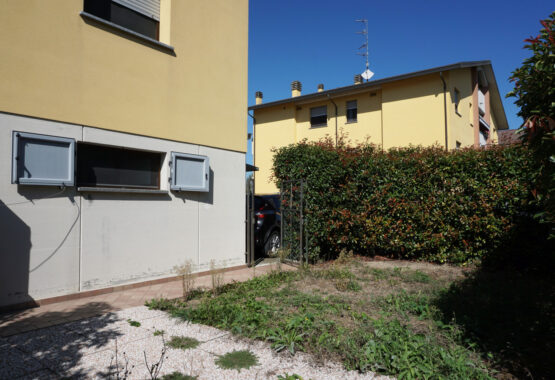 TRILOCALE CON GIARDINO PRIVATO