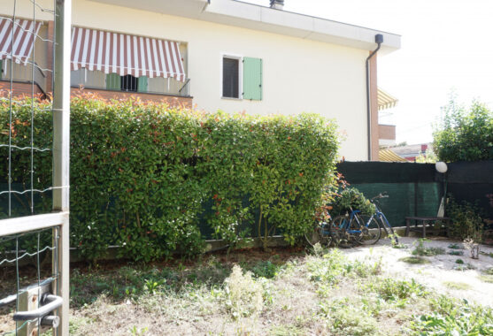 TRILOCALE CON GIARDINO PRIVATO