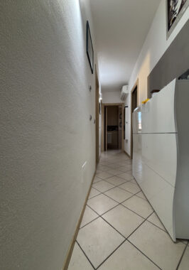 TRILOCALE CON GIARDINO PRIVATO