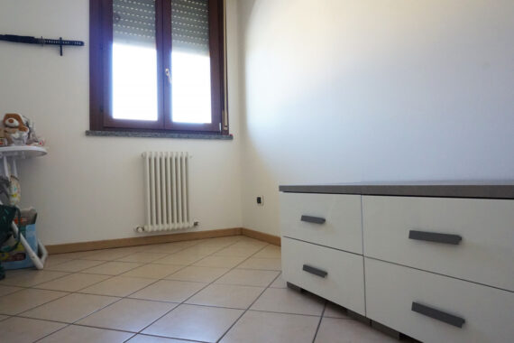 TRILOCALE CON GIARDINO PRIVATO