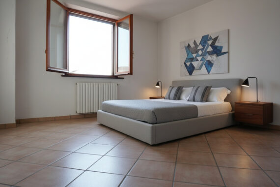 PORZIONE DI CASA DI TESTA CON AMPIO TERRENO CIRCOSTANTE