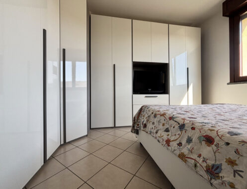 TRILOCALE CON GIARDINO PRIVATO